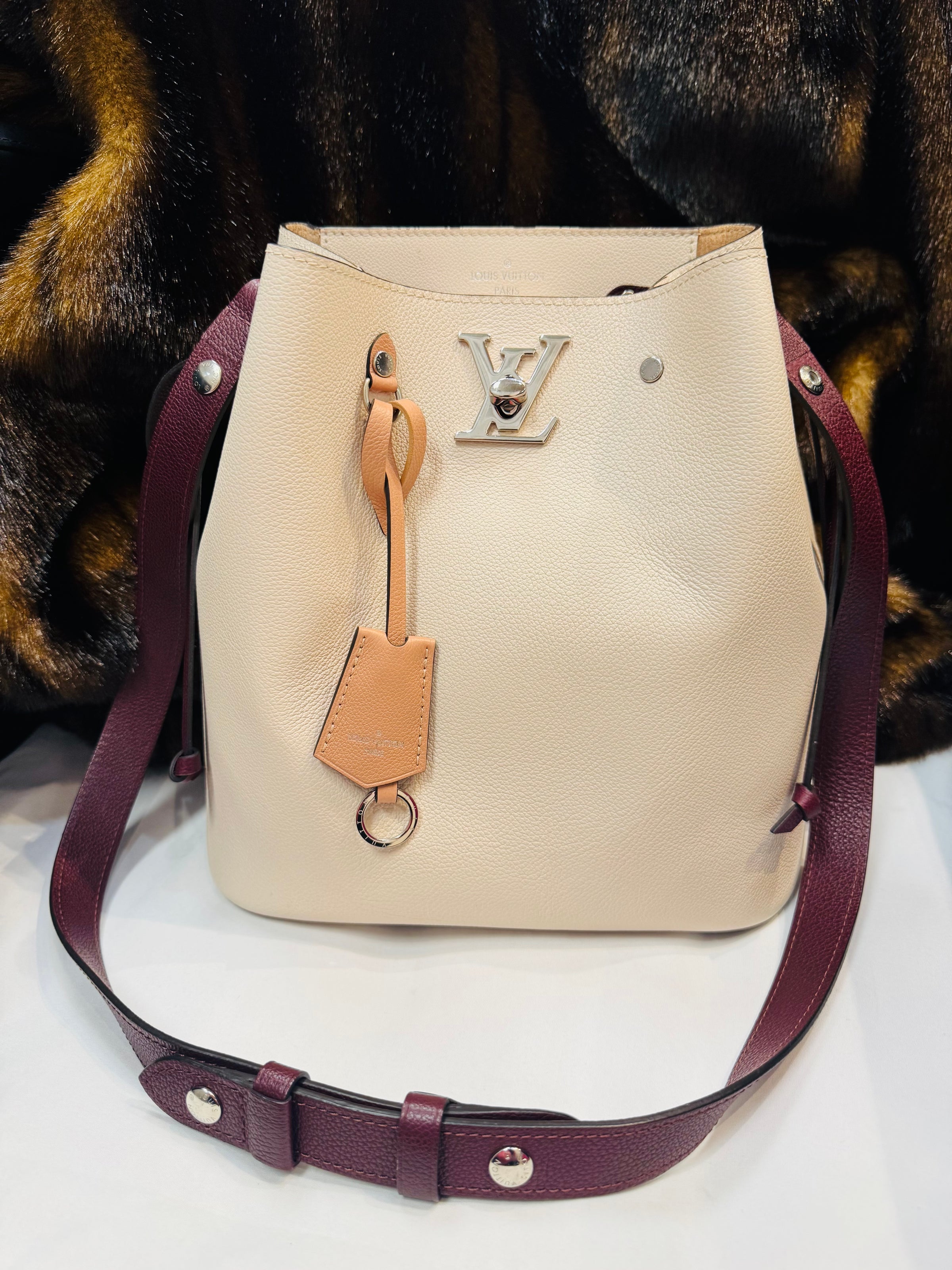 SOLD - Louis Vuitton Cream Bucket Bag | La Glam Consignment Boutique