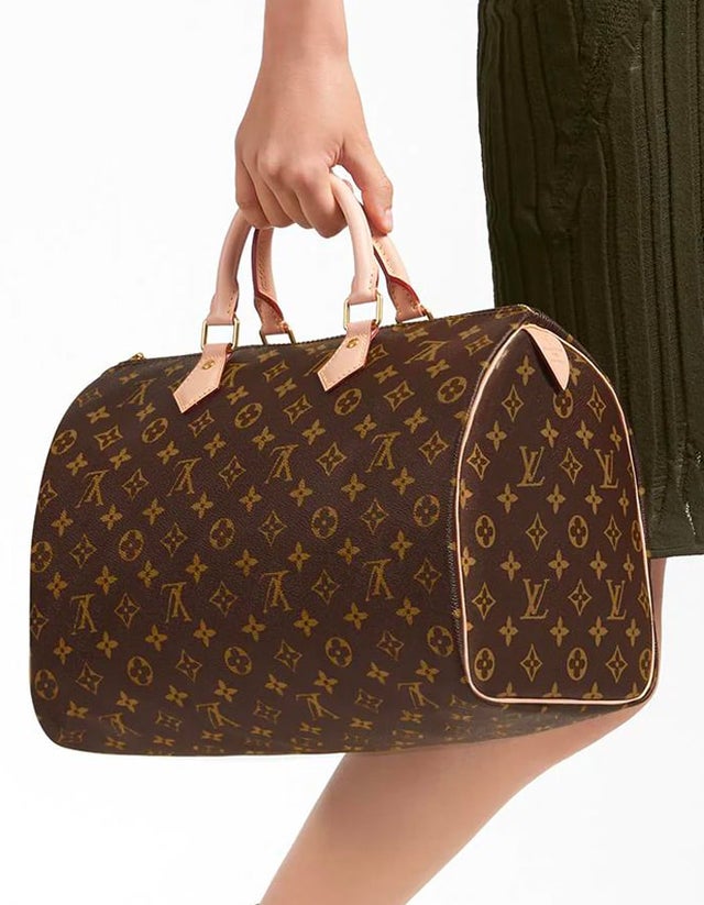 LV Bandouliere Keepall 60  La Glam Consignment Boutique